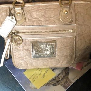 Coach poppy purse used but nice gold and white